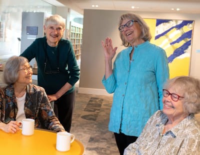 Residents enjoying conversation in a common area