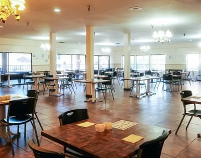 Dining room with empty tables and chairs