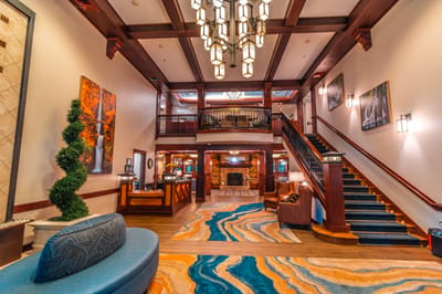 Interior view of a lobby with stairs and seating