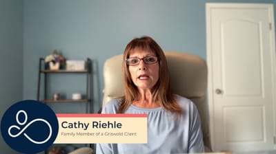 A woman speaking as a family member of a client