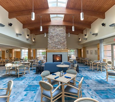 Spacious dining room with large windows and modern decor