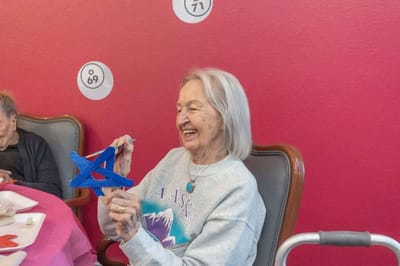 Resident engaged in an arts and crafts activity