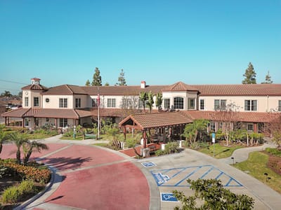 Exterior view of Ivy Park at La Palma with pathways and landscaping