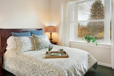 Cozy bedroom with a view and decorative elements