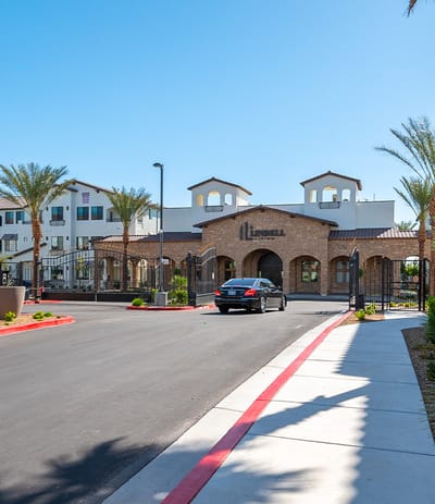 Exterior view of Lindell Living facility with green landscaping