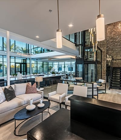 Bright and modern common area with seating and large windows
