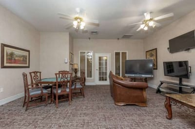 Interior common area with seating and dining table