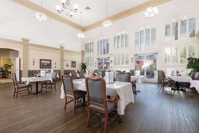 Dining area with tables neatly arranged and decorated