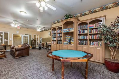 Interior common area with bookshelves and seating