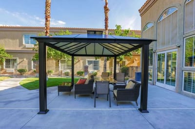 Outdoor seating area with gazebo and furniture