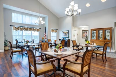 Bright dining room with tables and chairs