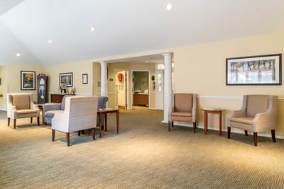 Bright interior common area with seating arrangements