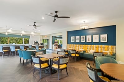 Common area with seating and bookshelves