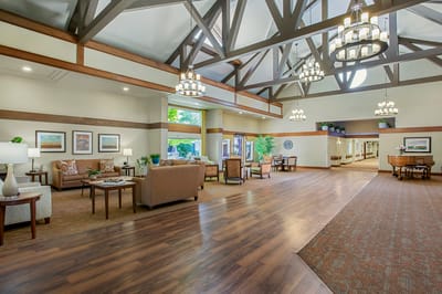 Bright common area with stylish furniture and decor