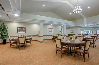 Dining area with tables set for a meal