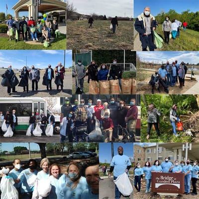 Residents and staff participating in a community clean-up event