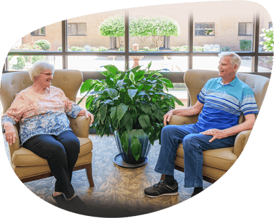 Residents enjoying conversation in a common area