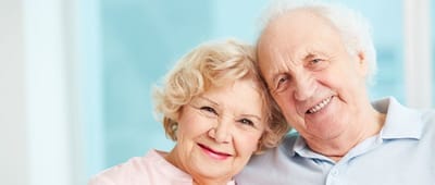 Happy elderly couple smiling together