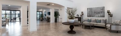Bright and inviting common area with seating and decor