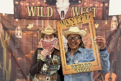 Residents enjoying a themed event with props