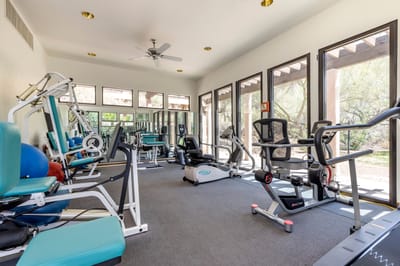 Interior view of a fitness room with exercise equipment