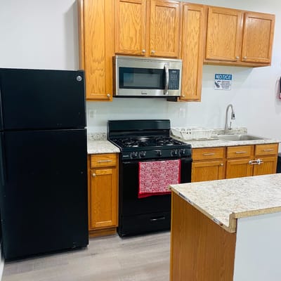 Bright kitchen area with modern appliances
