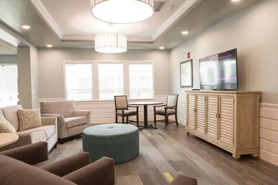 Cozy common area with comfortable seating and a TV