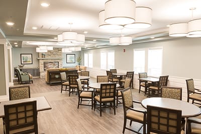 Interior view of a bright common area with seating