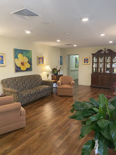 Cozy common area with comfortable seating and artwork