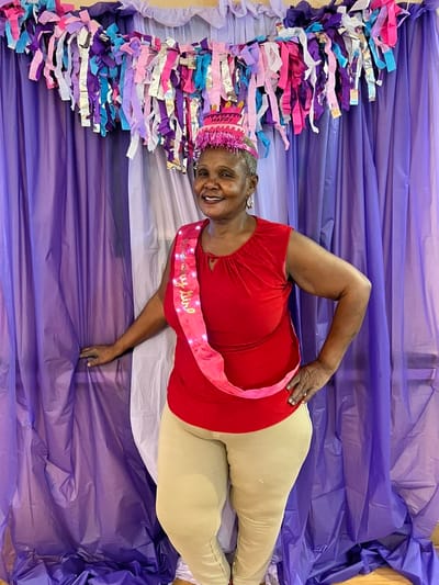 Resident celebrating with birthday decorations