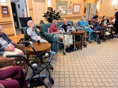 Residents engaging in a common area activity