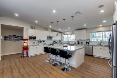 Bright and modern kitchen area with seating