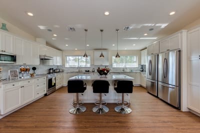 Bright kitchen with modern appliances and seating