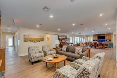 Common area with seating and decor for residents