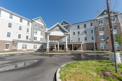 Exterior view of the Oasis at 56th building entrance