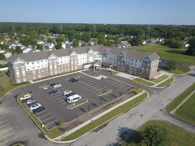 Aerial view of the Oasis at 56th facility with parking lot