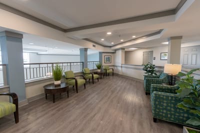 Bright common area with seating and plants