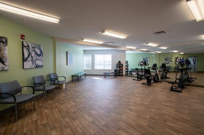 Interior view of a fitness room with exercise equipment