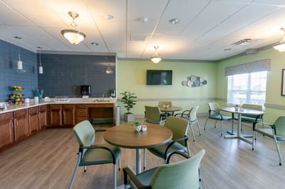 Interior common area with tables and chairs