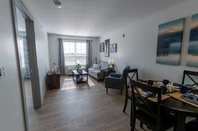 Bright common area with seating and decor