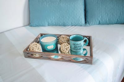 Decorative tray with candles and ornaments