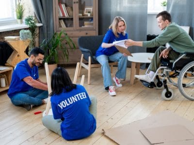 Residents and volunteers engaging in an activity