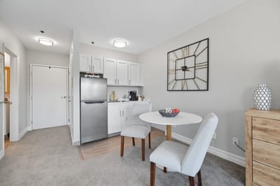 Cozy living space with kitchen and dining area