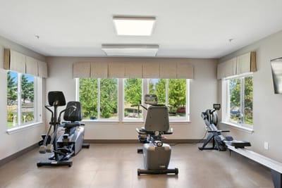 Bright fitness area with exercise equipment