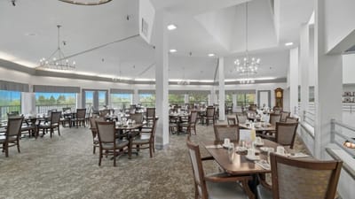 Spacious dining area with tables and chairs