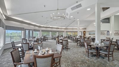 Dining area with tables set for breakfast