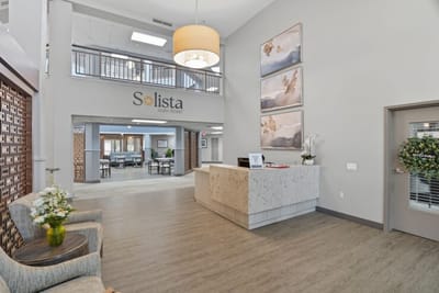 Welcoming lobby with reception and seating area