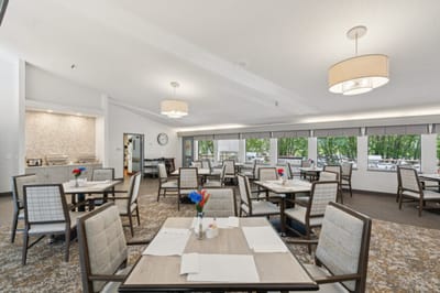 Dining area with tables set for meals