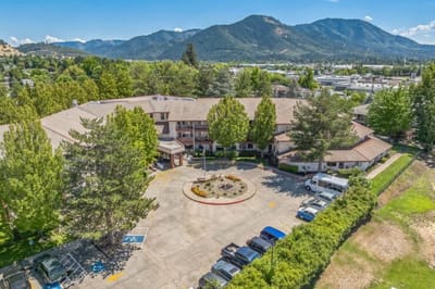 Aerial view of Solista Grants Pass facility with parking area.