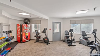 Interior fitness room with exercise equipment